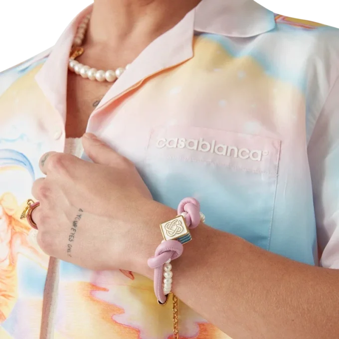 Brățară cu perle și noduri roz Brățară cu perle și noduri roz